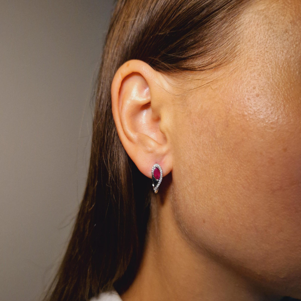 Gold earrings with a ruby