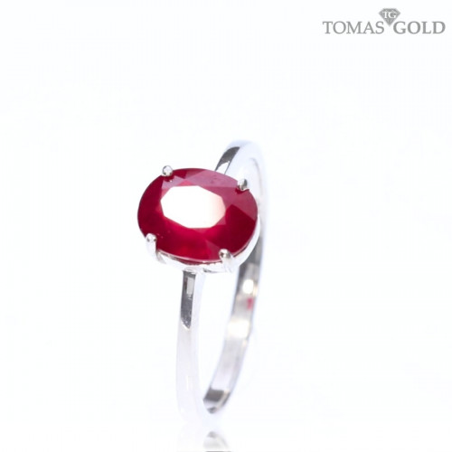 Silver ring with red corundum