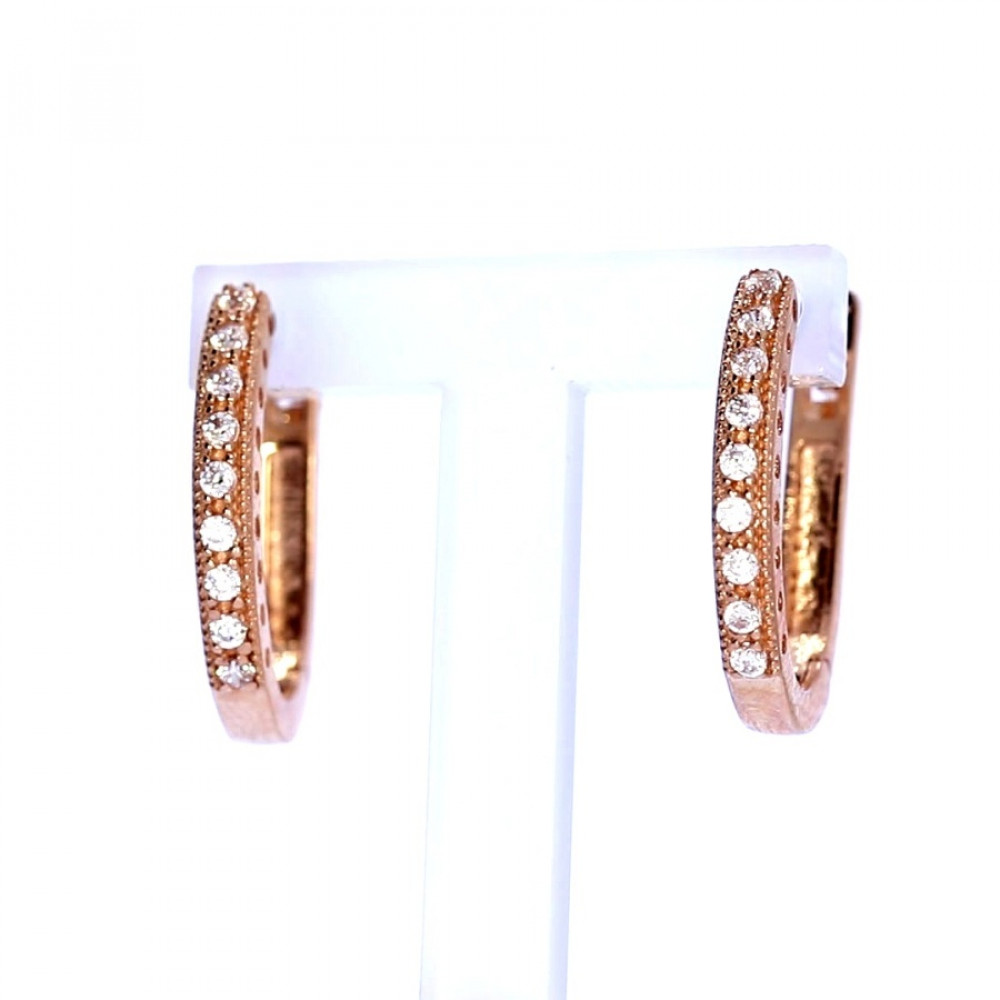 Gold earrings with zircon