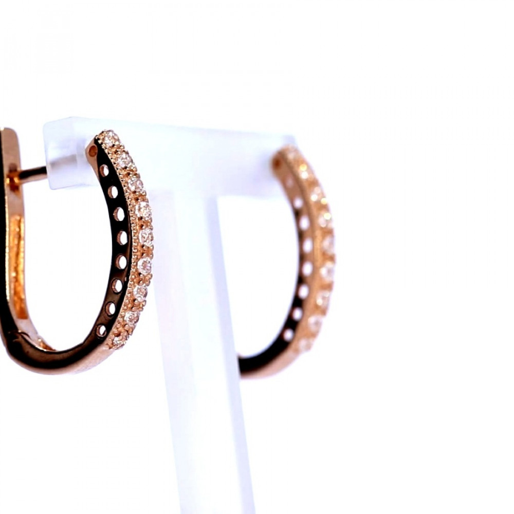 Gold earrings with zircon