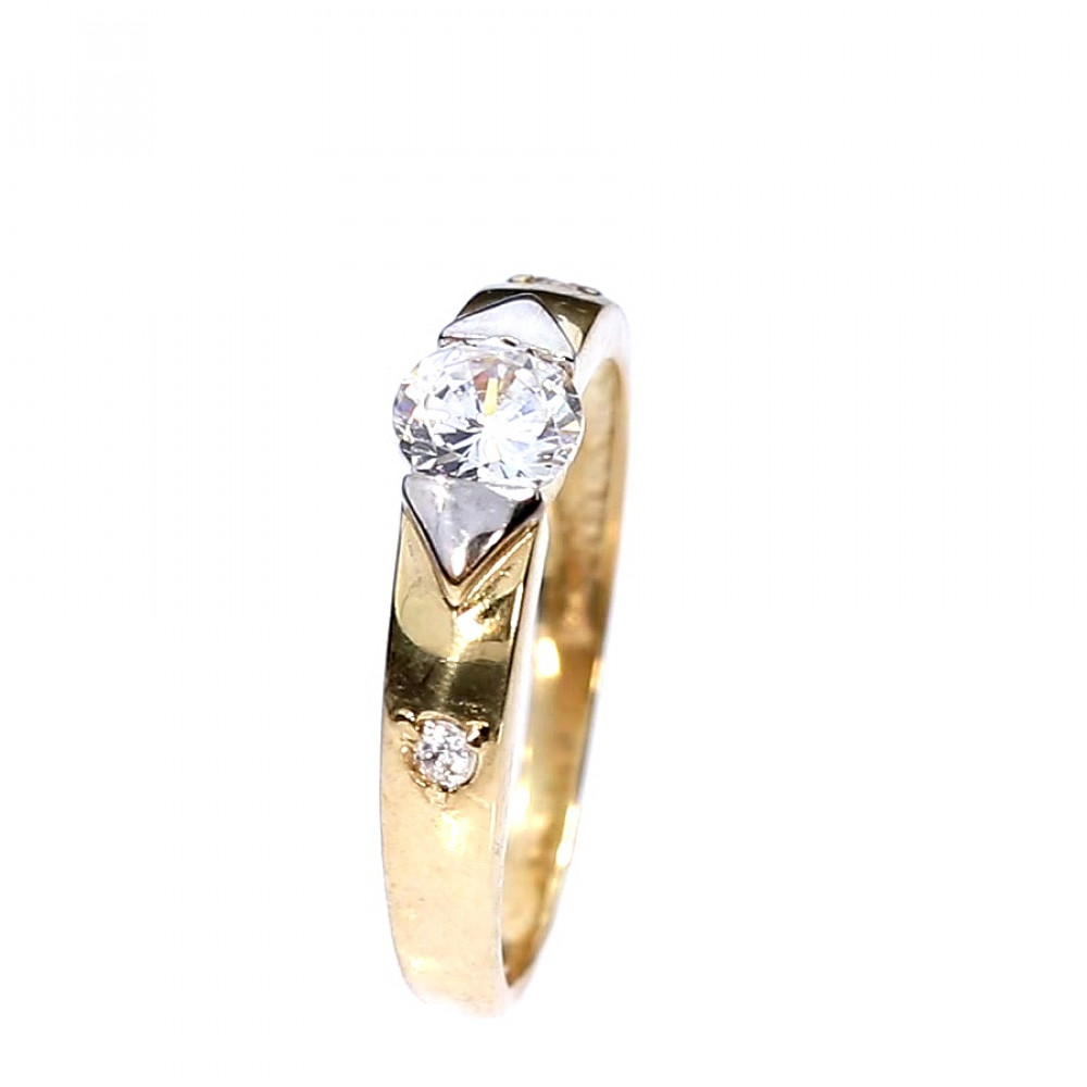 Golden ring with zircon
