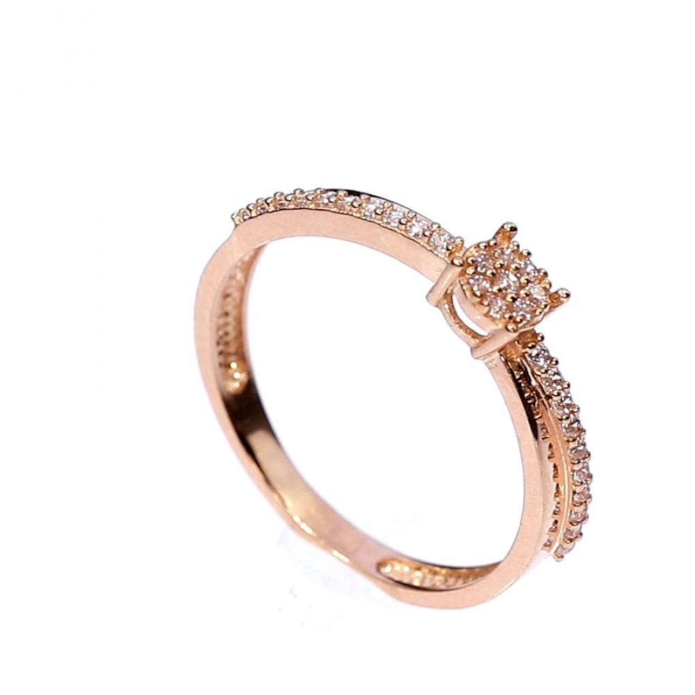 Golden ring with zircon