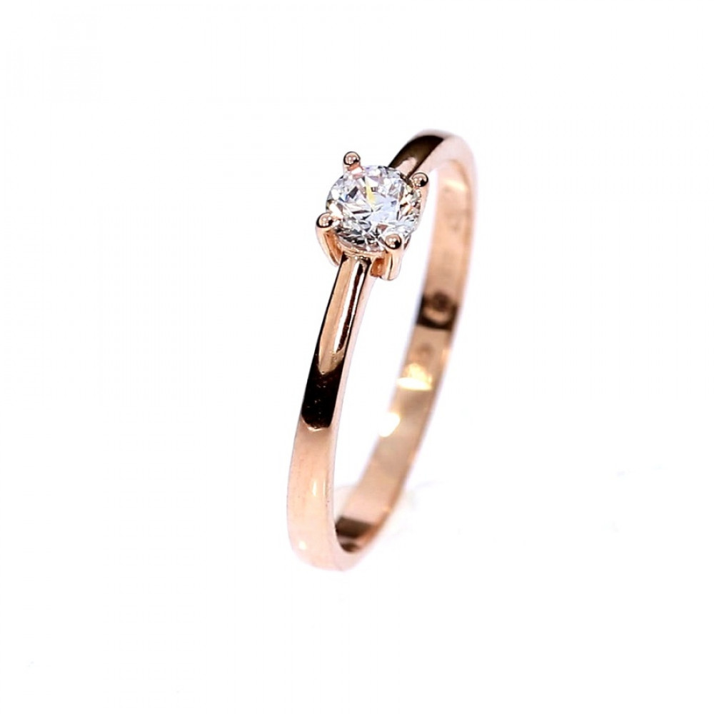 Golden ring with zircon