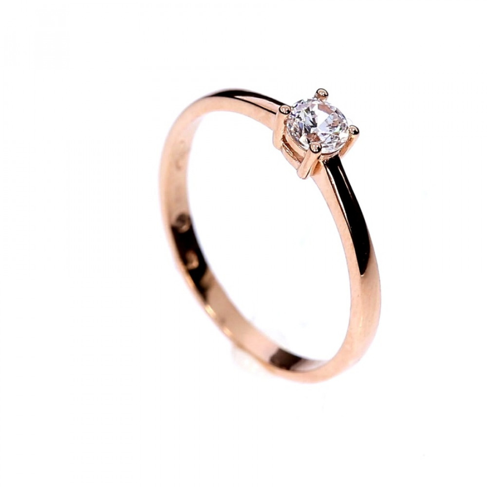 Golden ring with zircon