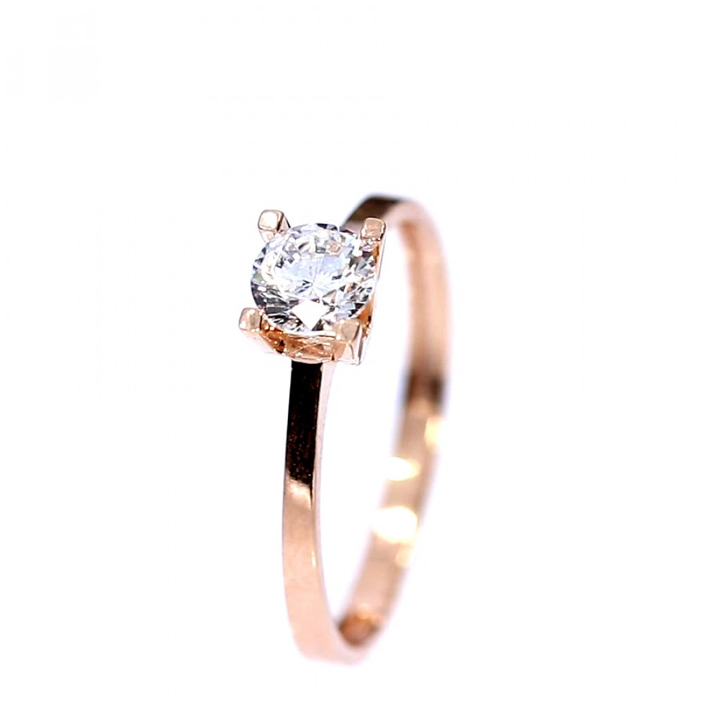 Golden ring with zircon