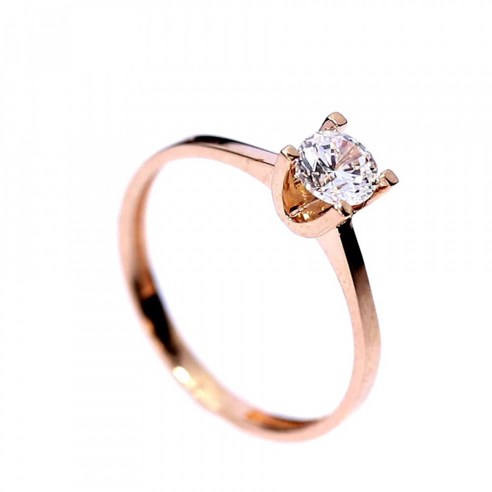 Golden ring with zircon