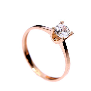 Golden ring with zircon