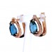 Gold earrings with London topaz