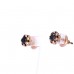 Gold earrings with a black diamond