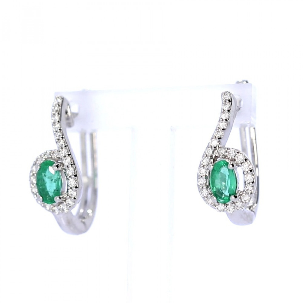 Gold earrings with emerald