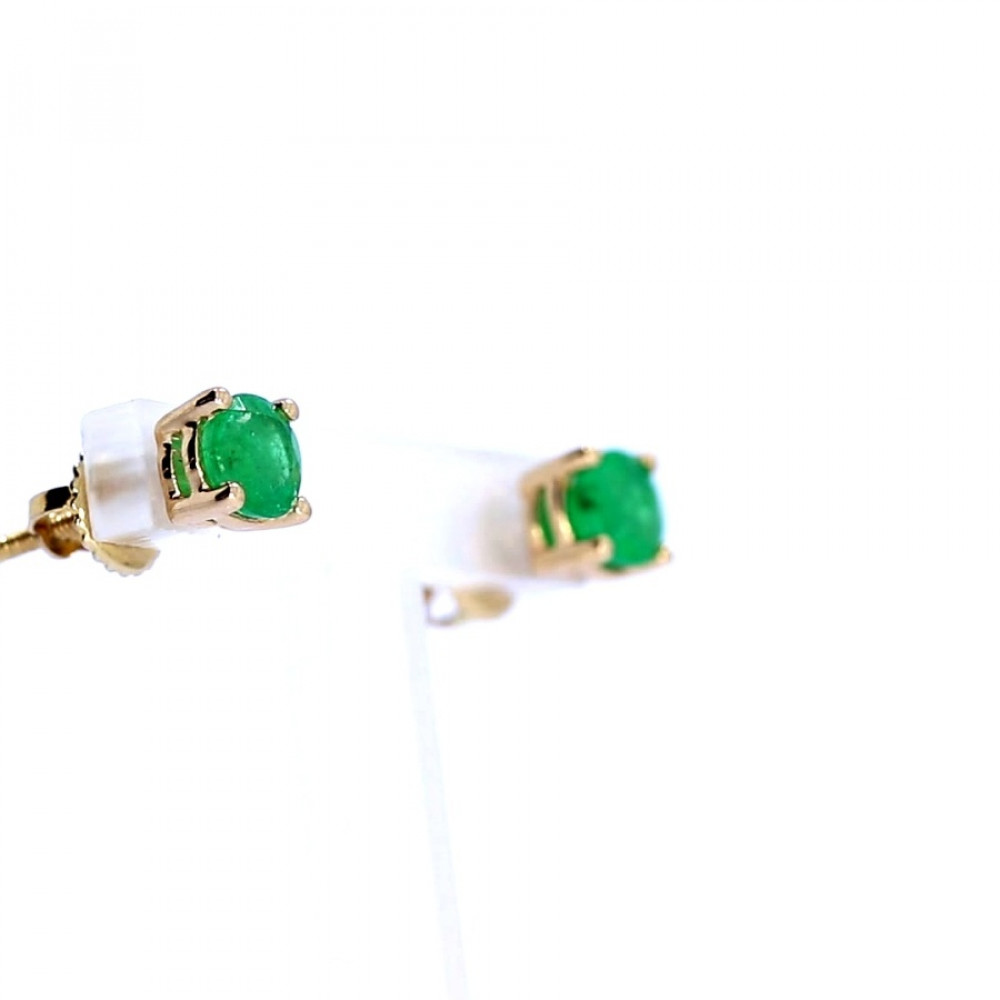 Gold earrings with emerald