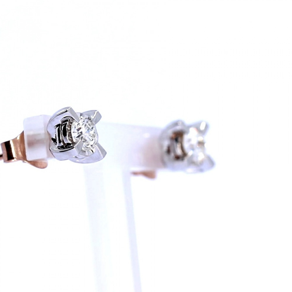 Золотые серьги с драгоценными камнями