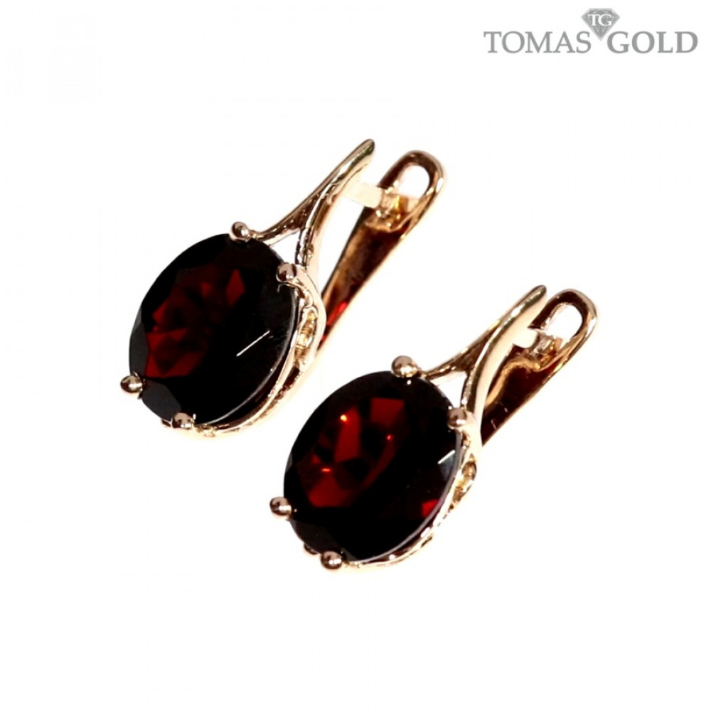 Golden earrings with garnet