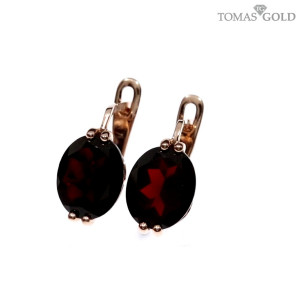 Golden earrings with garnet