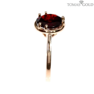 Gold ring with garnet
