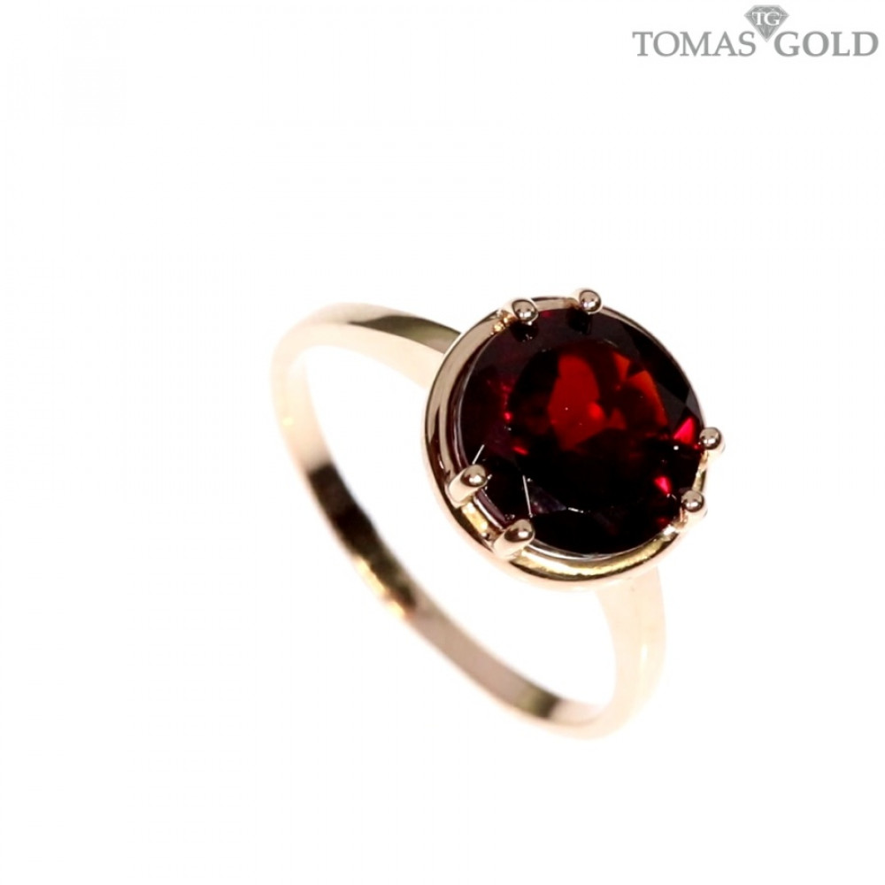 Gold ring with garnet