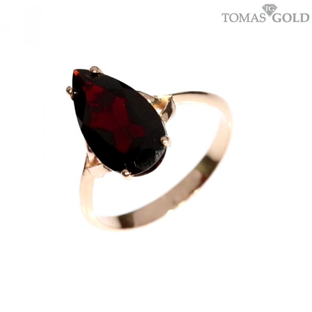 Gold ring with garnet