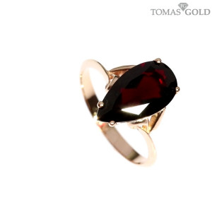 Gold ring with garnet