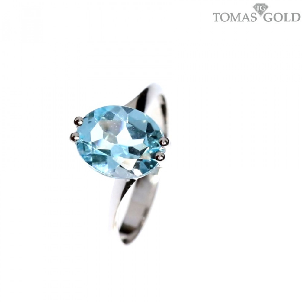 Gold ring with topaz