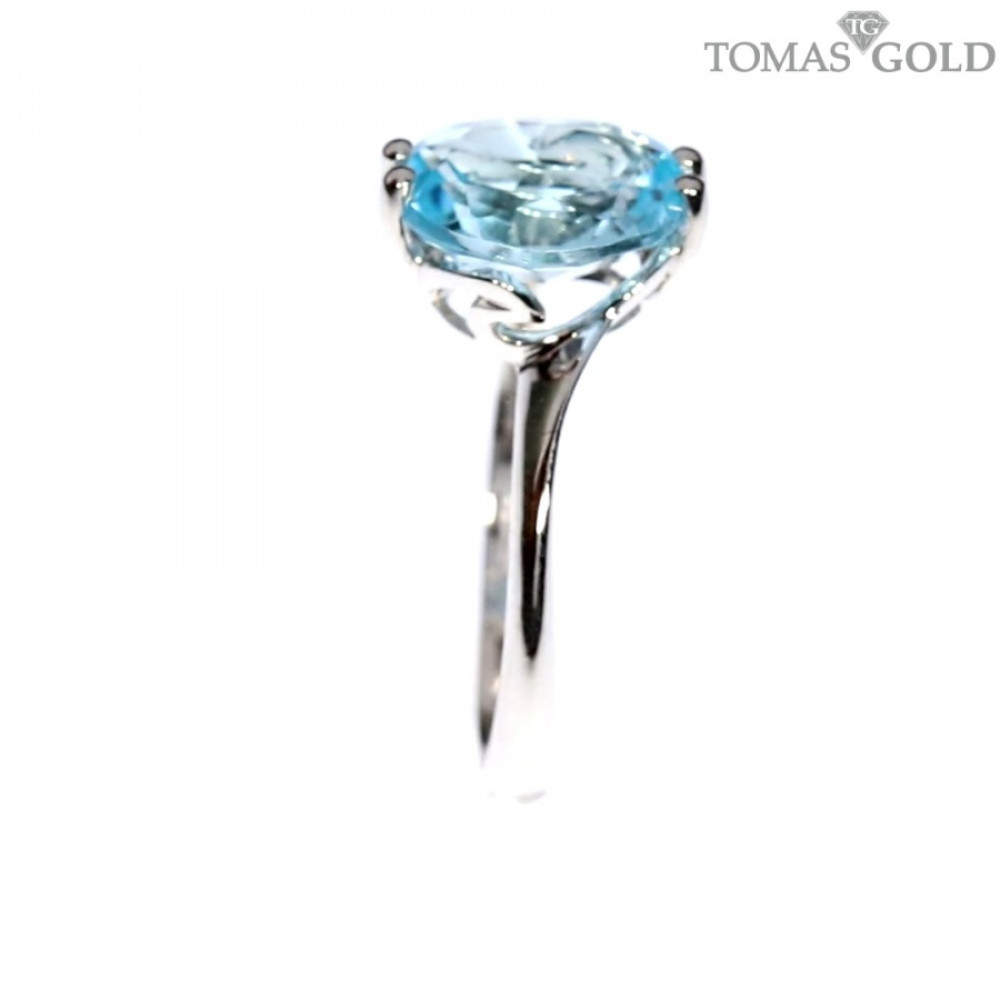 Gold ring with topaz