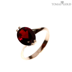 Gold ring with garnet