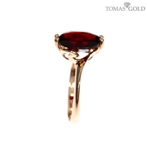 Gold ring with garnet