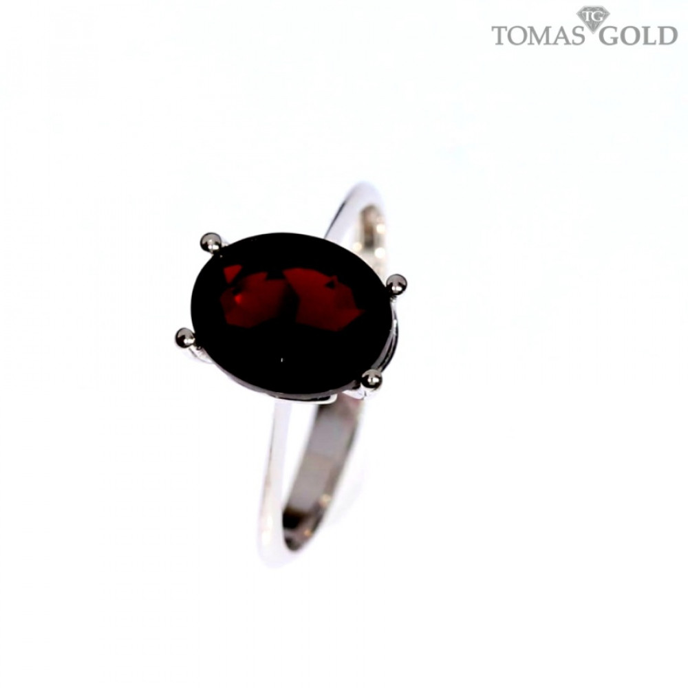 Gold ring with garnet