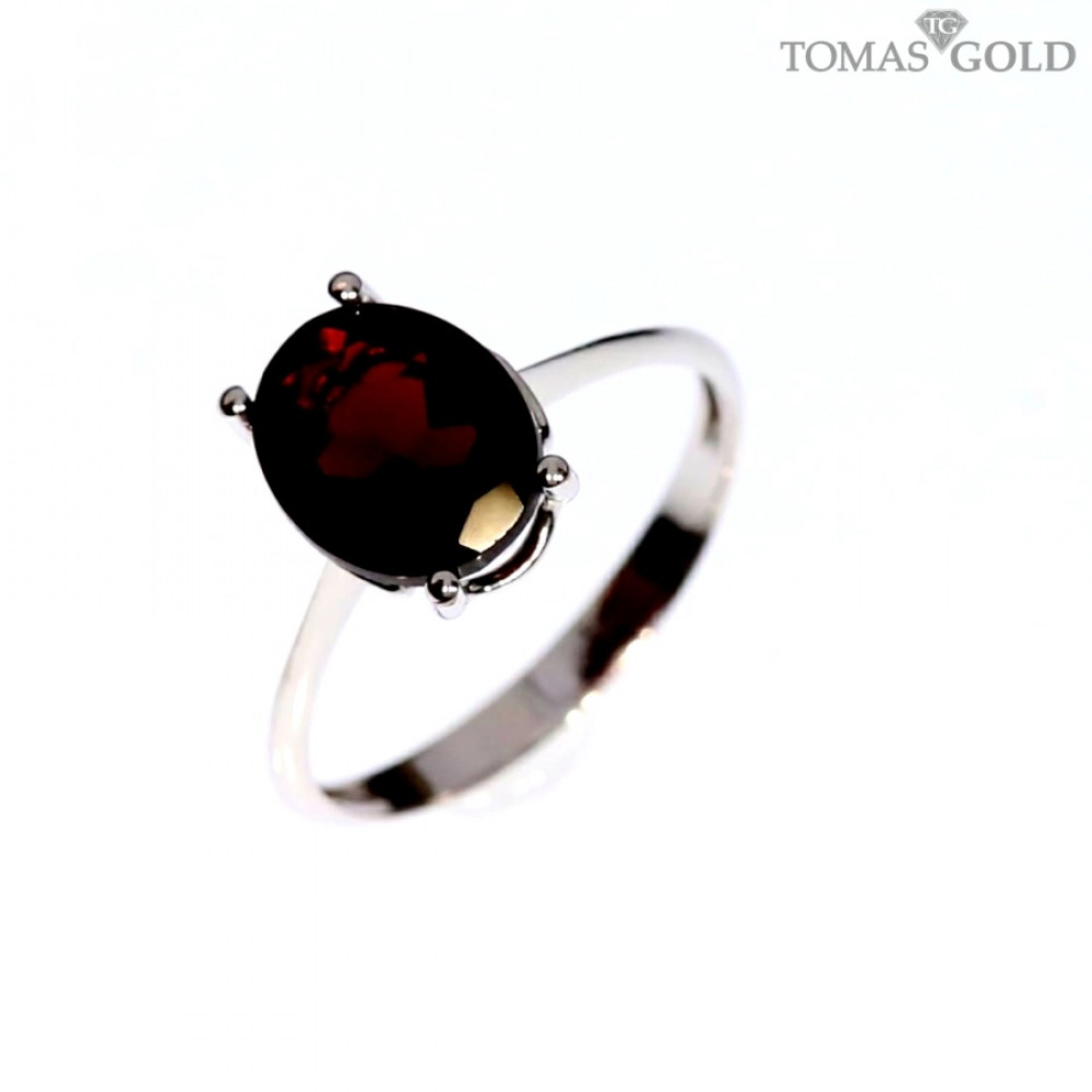 Gold ring with garnet