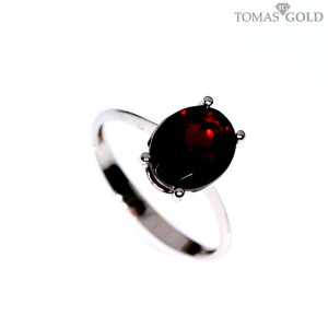 Gold ring with garnet