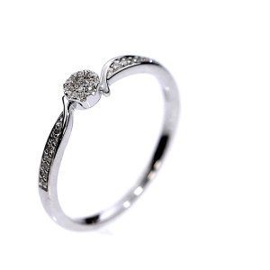 Golden ring with precious stones