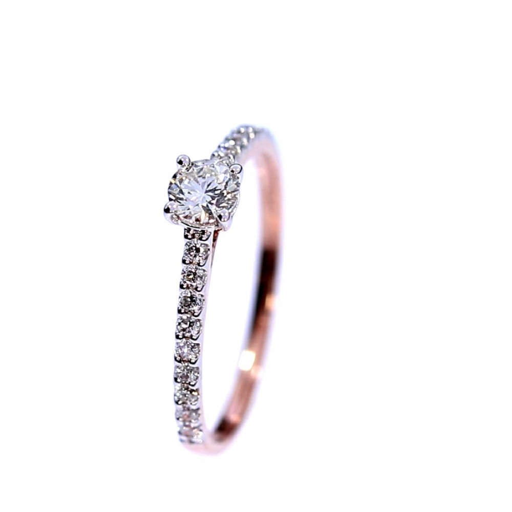 Golden ring with precious stones