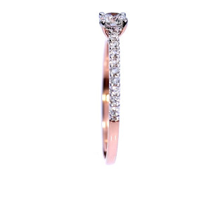 Golden ring with precious stones