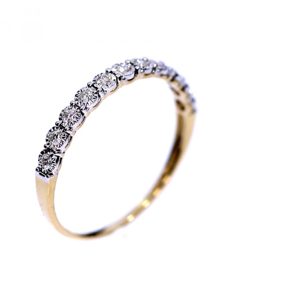 Golden ring with precious stones