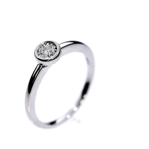 Golden ring with precious stones