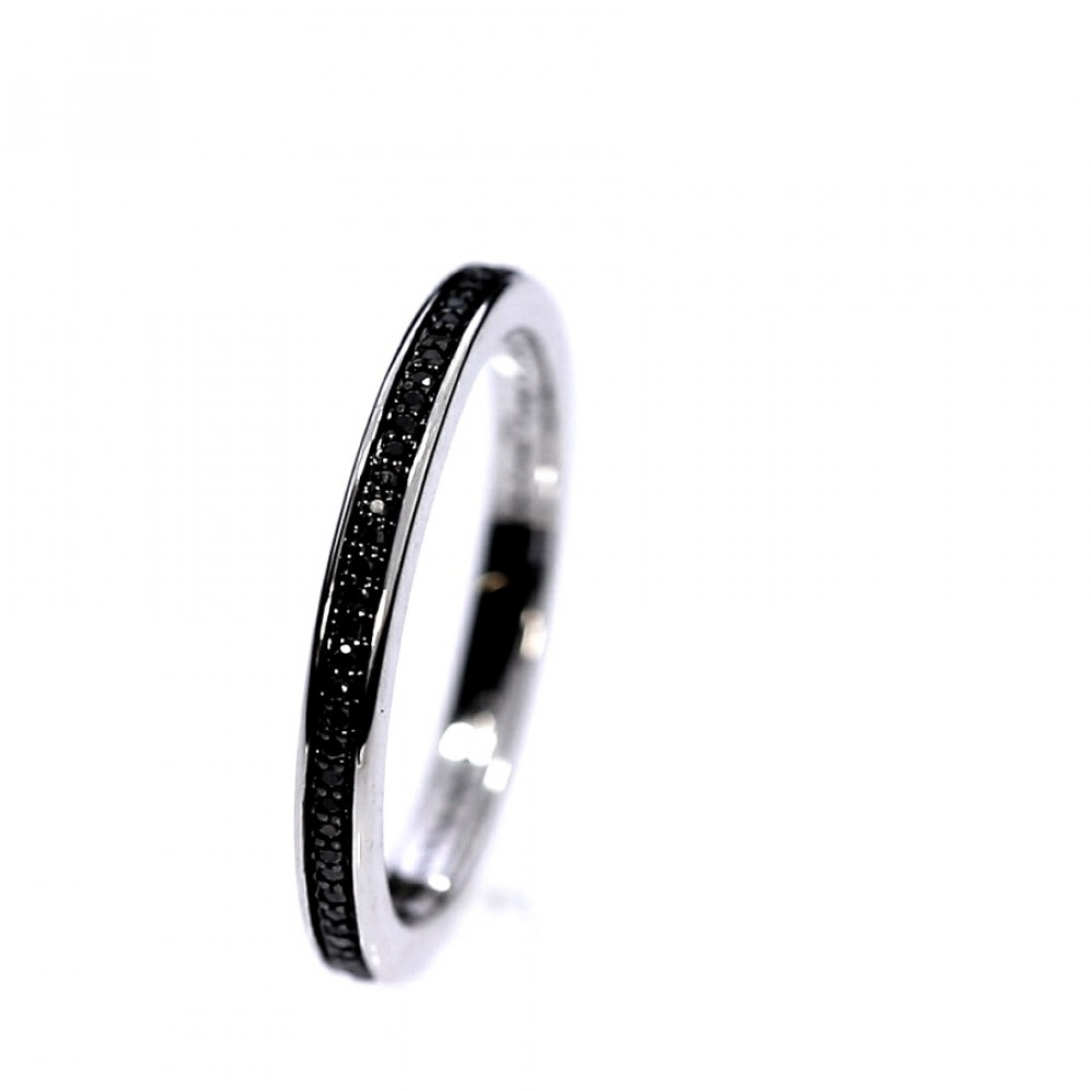 Golden ring with precious stones