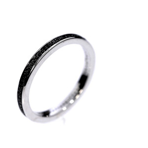 Golden ring with precious stones