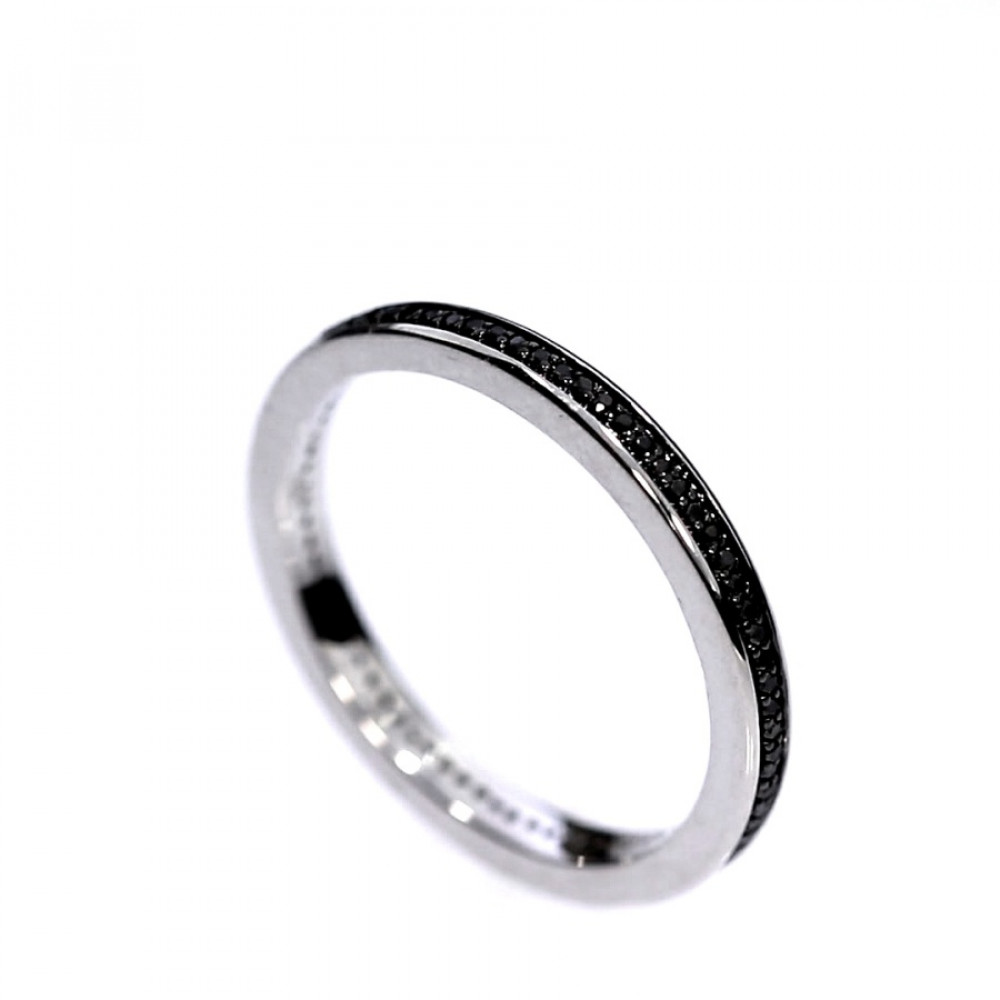 Golden ring with precious stones