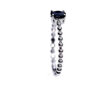 Golden ring with precious stones