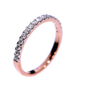 Golden ring with precious stones