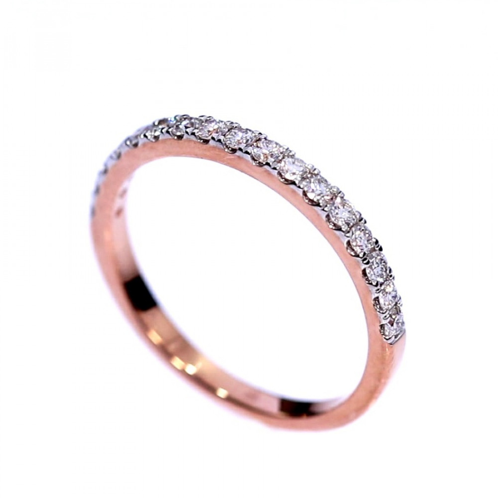 Golden ring with precious stones