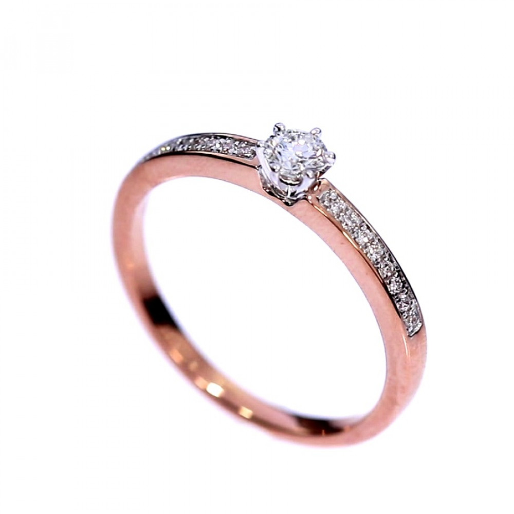 Golden ring with precious stones