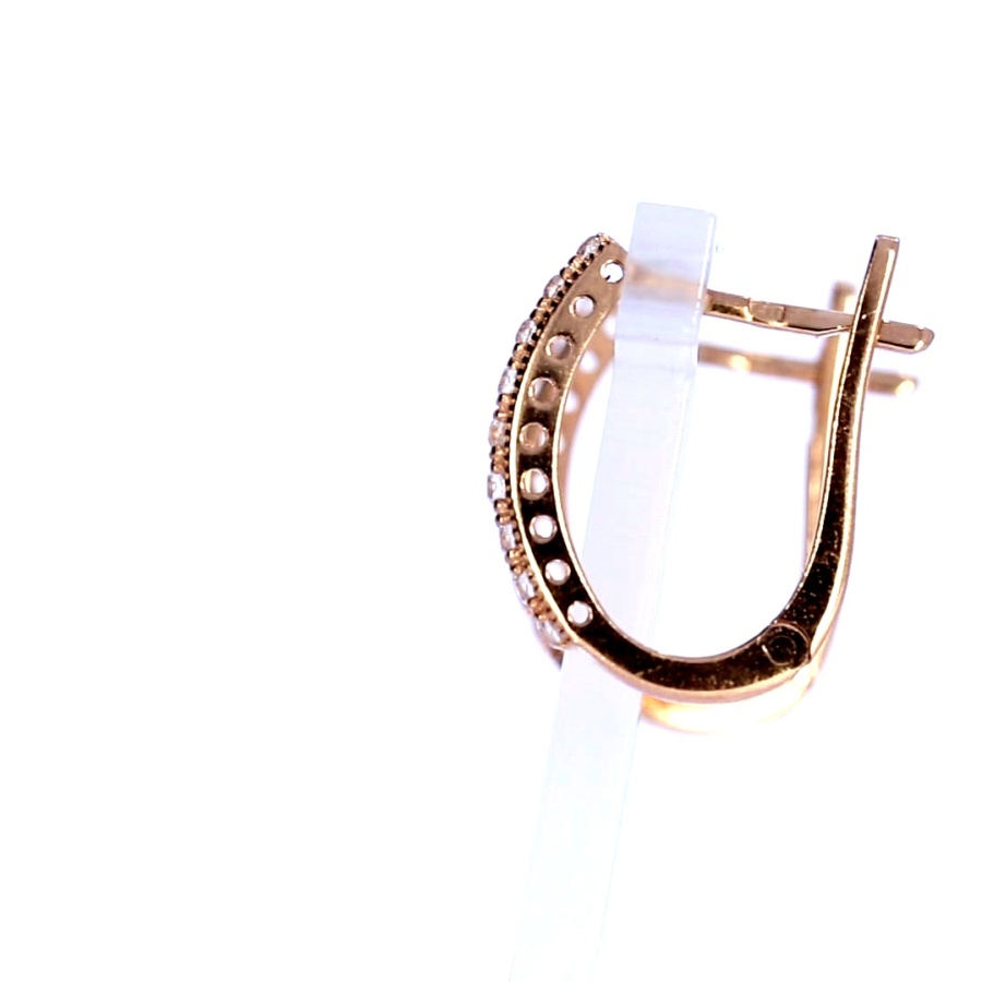 Gold earrings with zircon