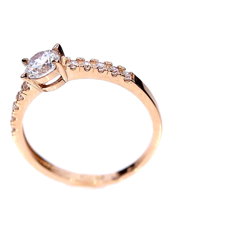 Golden ring with zircon