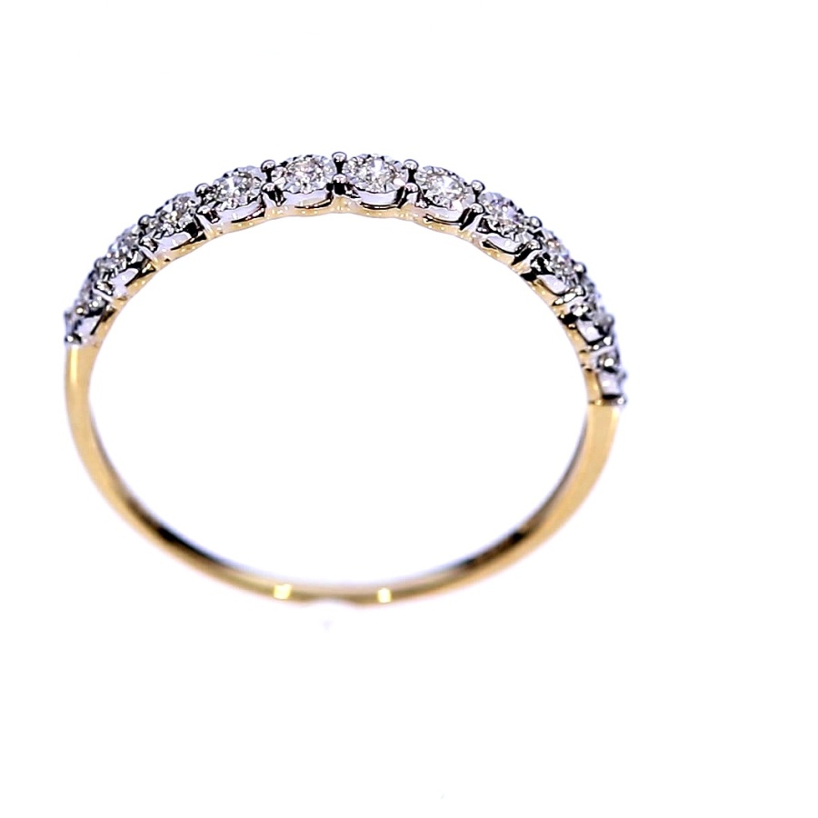 Golden ring with precious stones