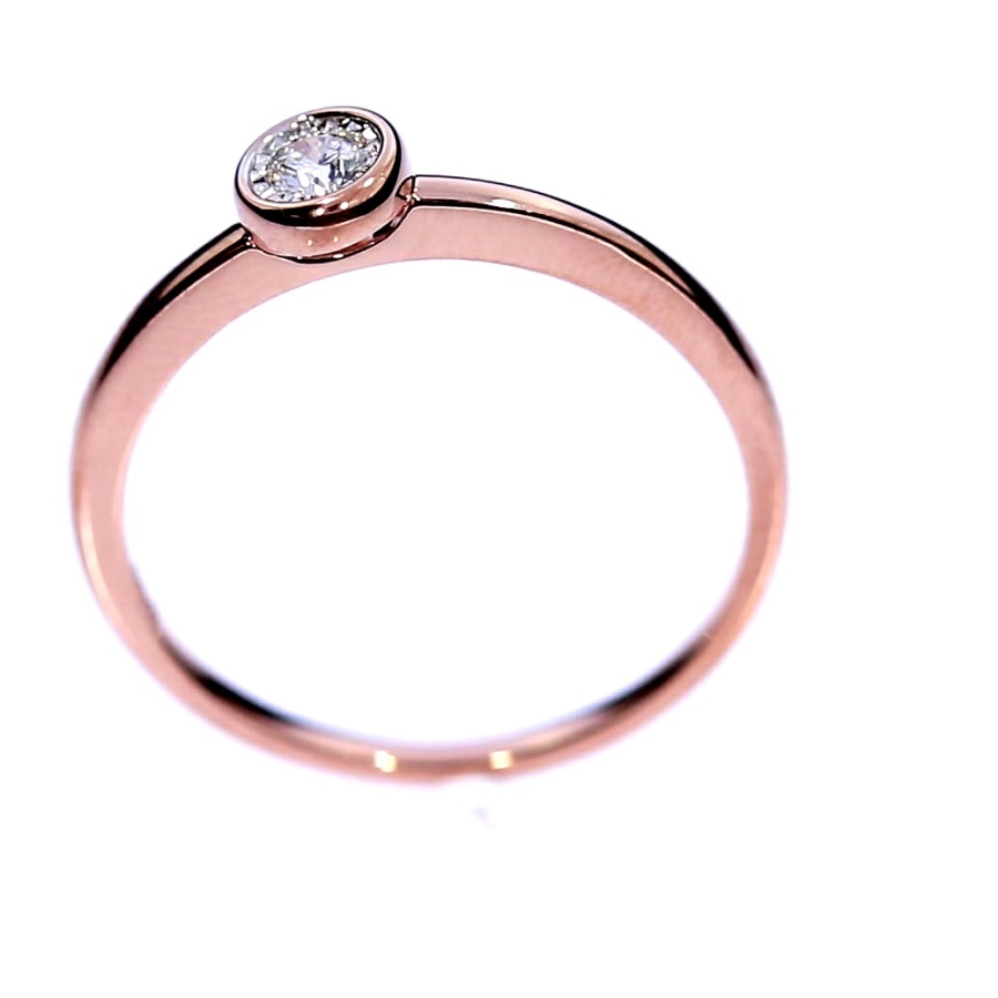 Golden ring with precious stones