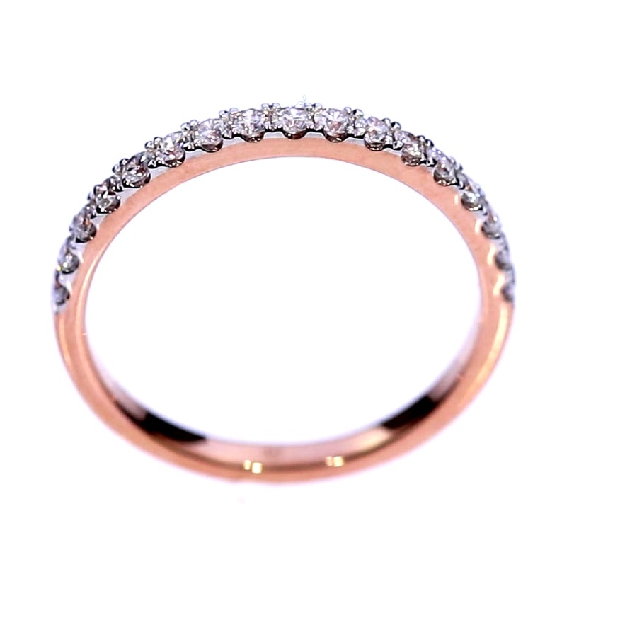 Golden ring with precious stones