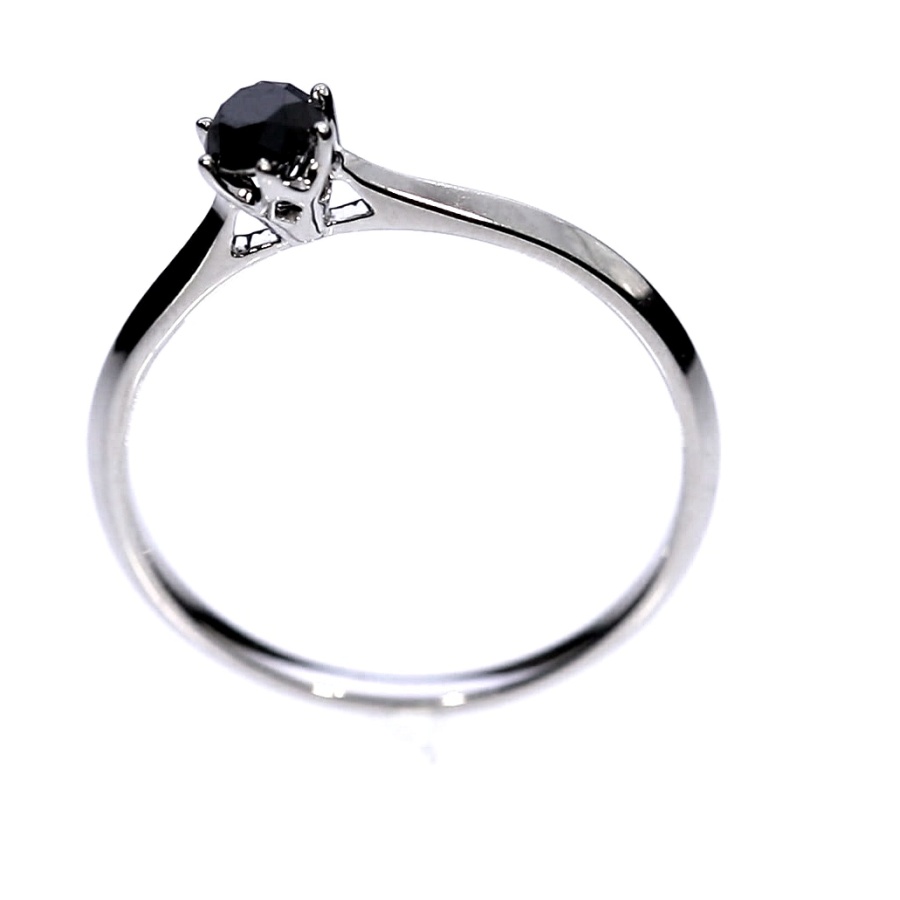 Golden ring with precious stones